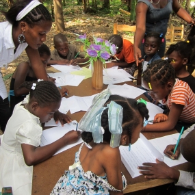Children in Haitian Educational Initiatives after school tutoring program.