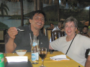 Donna Allen enjoying a meal with a tour guide in Nicaragua.