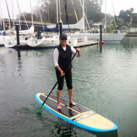 Kristi mastering the paddleboard.