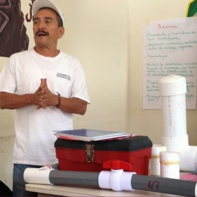 A Compatible Technologies employee presents training to a local water committee.