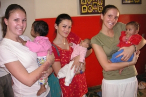 Dave's daughters and daughter-in-law at a HOPE worldwide orphanage in India.