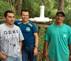 Water committee leaders at a CTI chlorinator installation in Santa Maura.