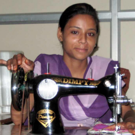 This young lady started a sewing business with a HOPE worldwide micro-loan.